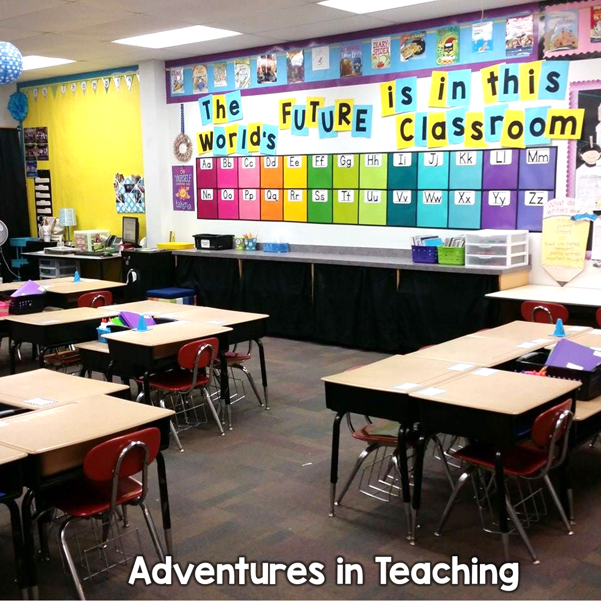 Bright and colorful 1st grade classroom with desks in groups and a quote on the wall that says "The world's future is in this classroom".